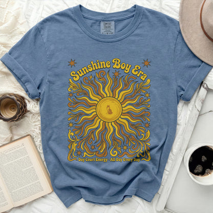 Blue t-shirt with "Sunshine Boy Era" and sun graphic.