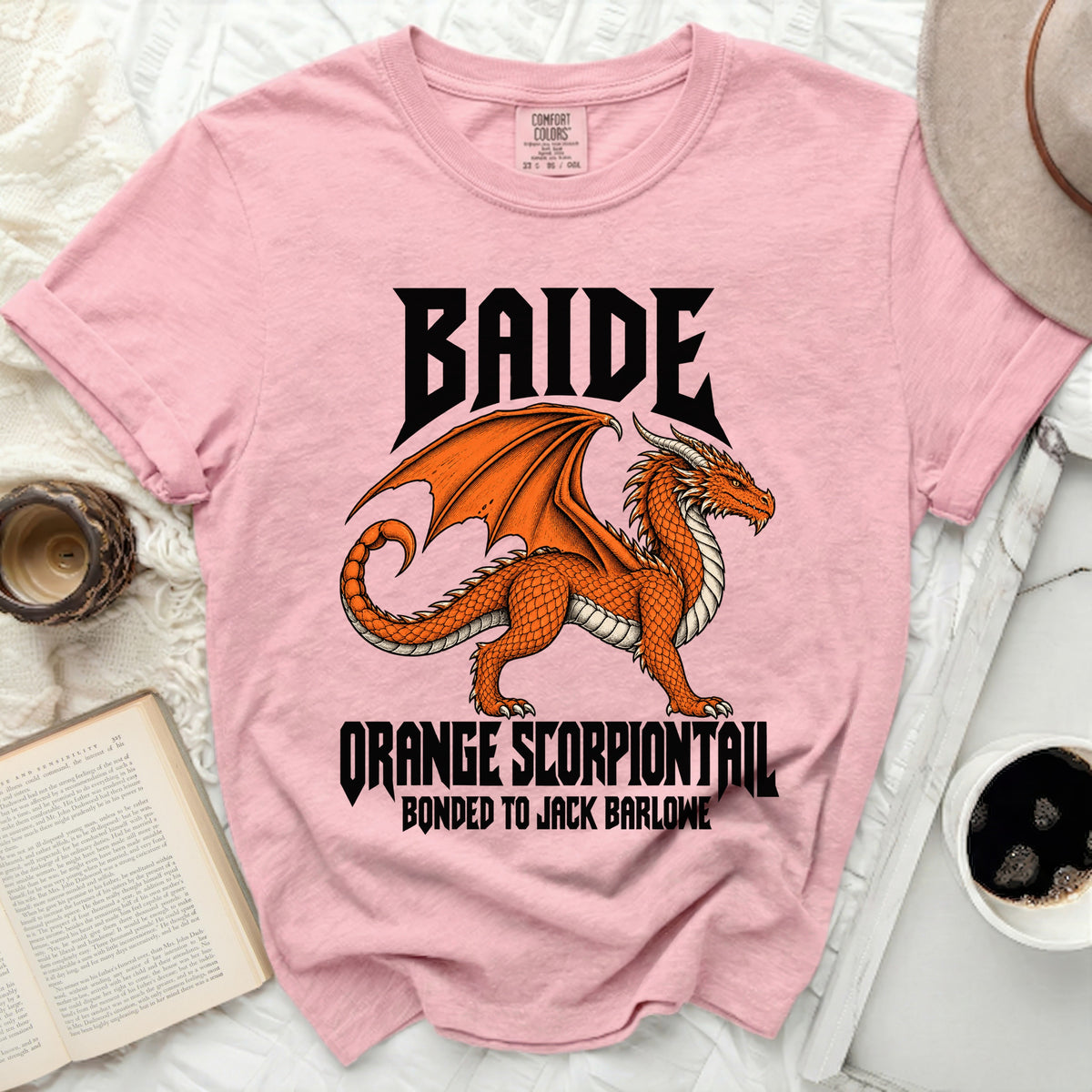 Pink t-shirt with black text "BAIDE" and an orange dragon design.
