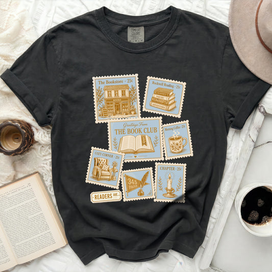T-shirt featuring postage stamps with bookstore, reading, and coffee themes.