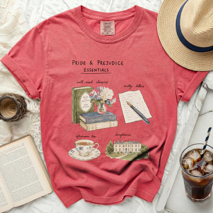 Pink t-shirt with "Pride & Prejudice Essentials" graphic.