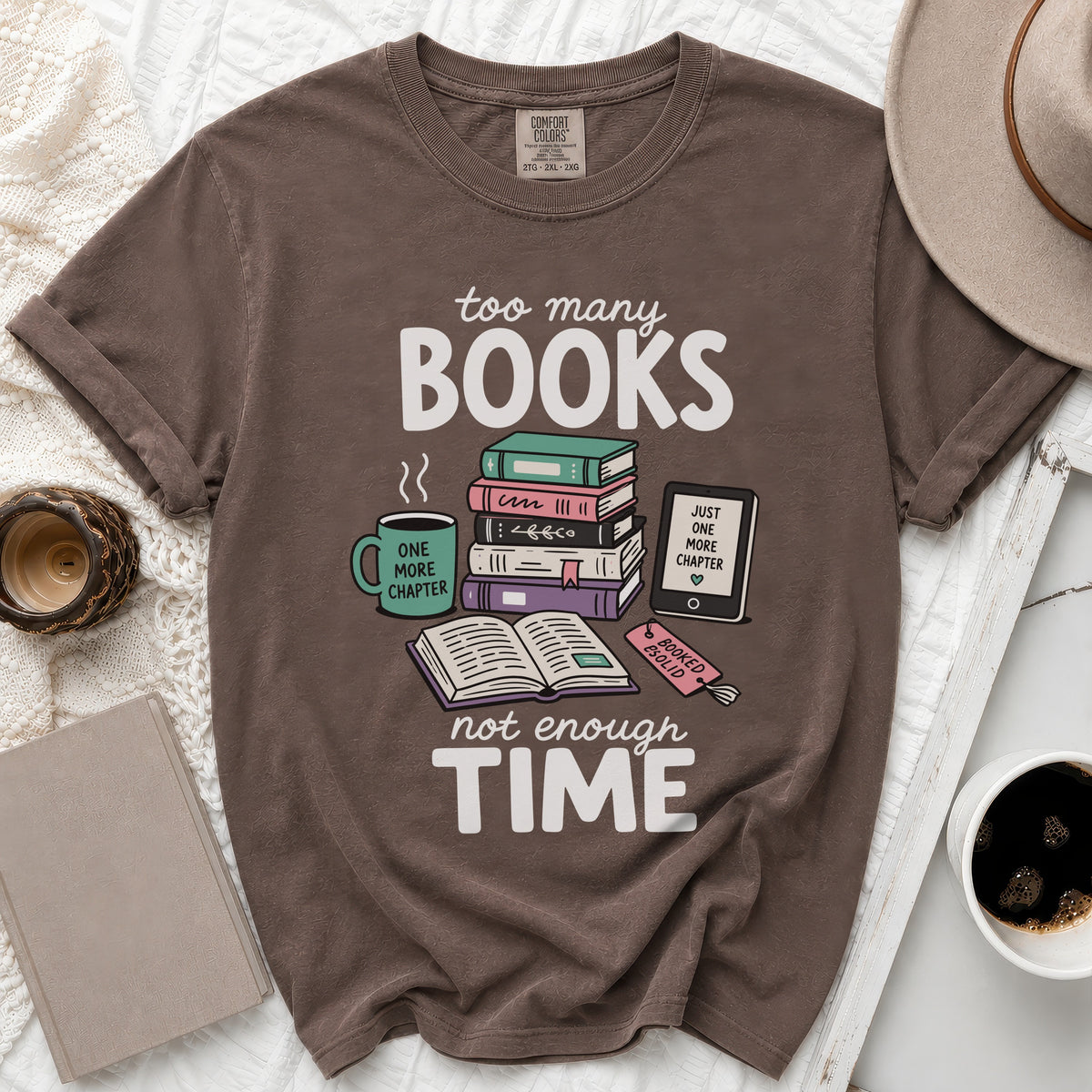 Brown t-shirt with "too many BOOKS not enough TIME" graphic.