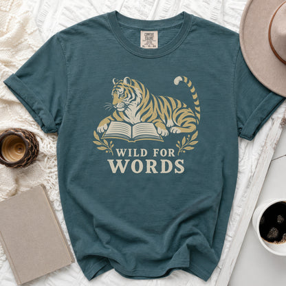 Teal t-shirt with tiger reading book graphic and text "WILD FOR WORDS".