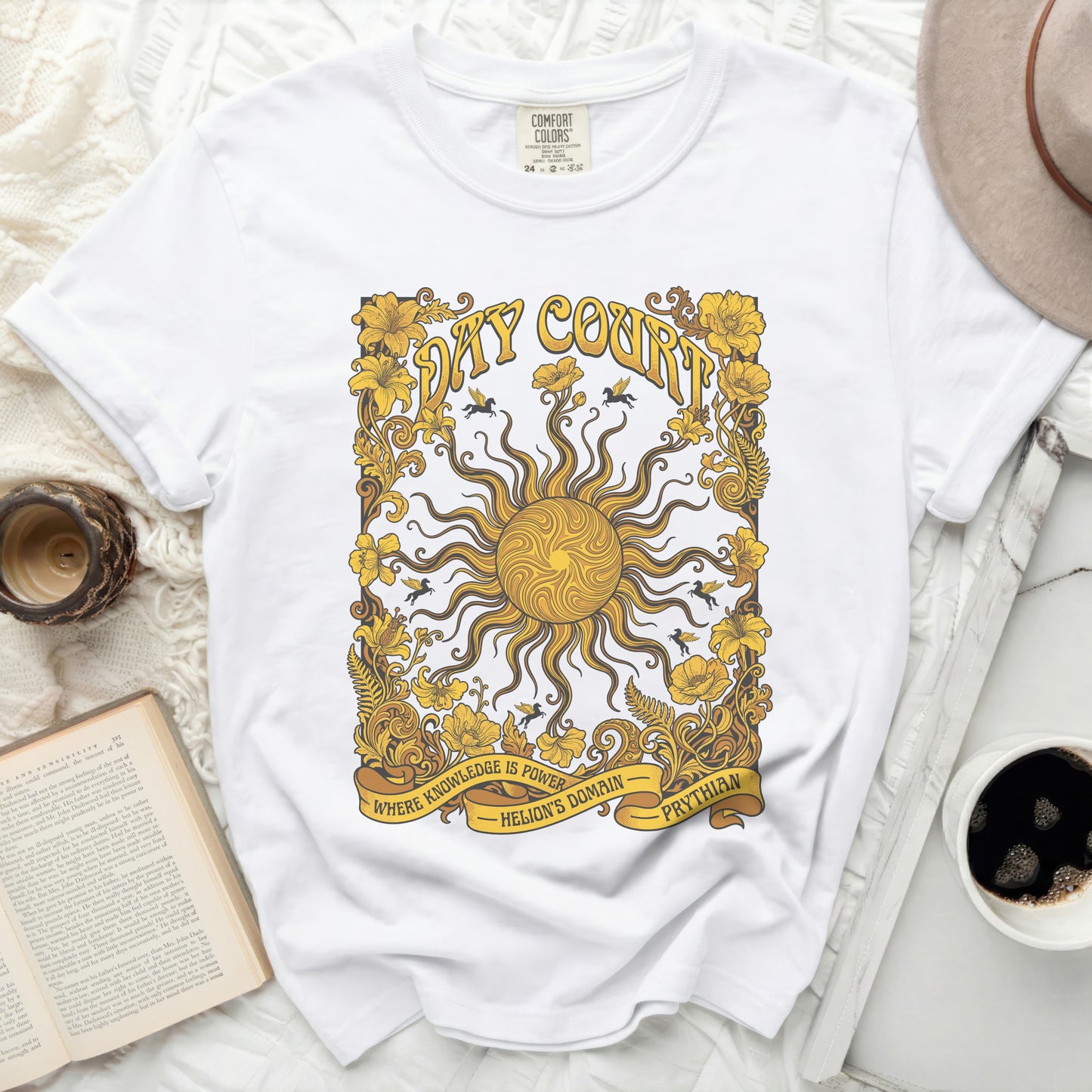 White t-shirt with yellow sun graphic and text "DAY COURT".