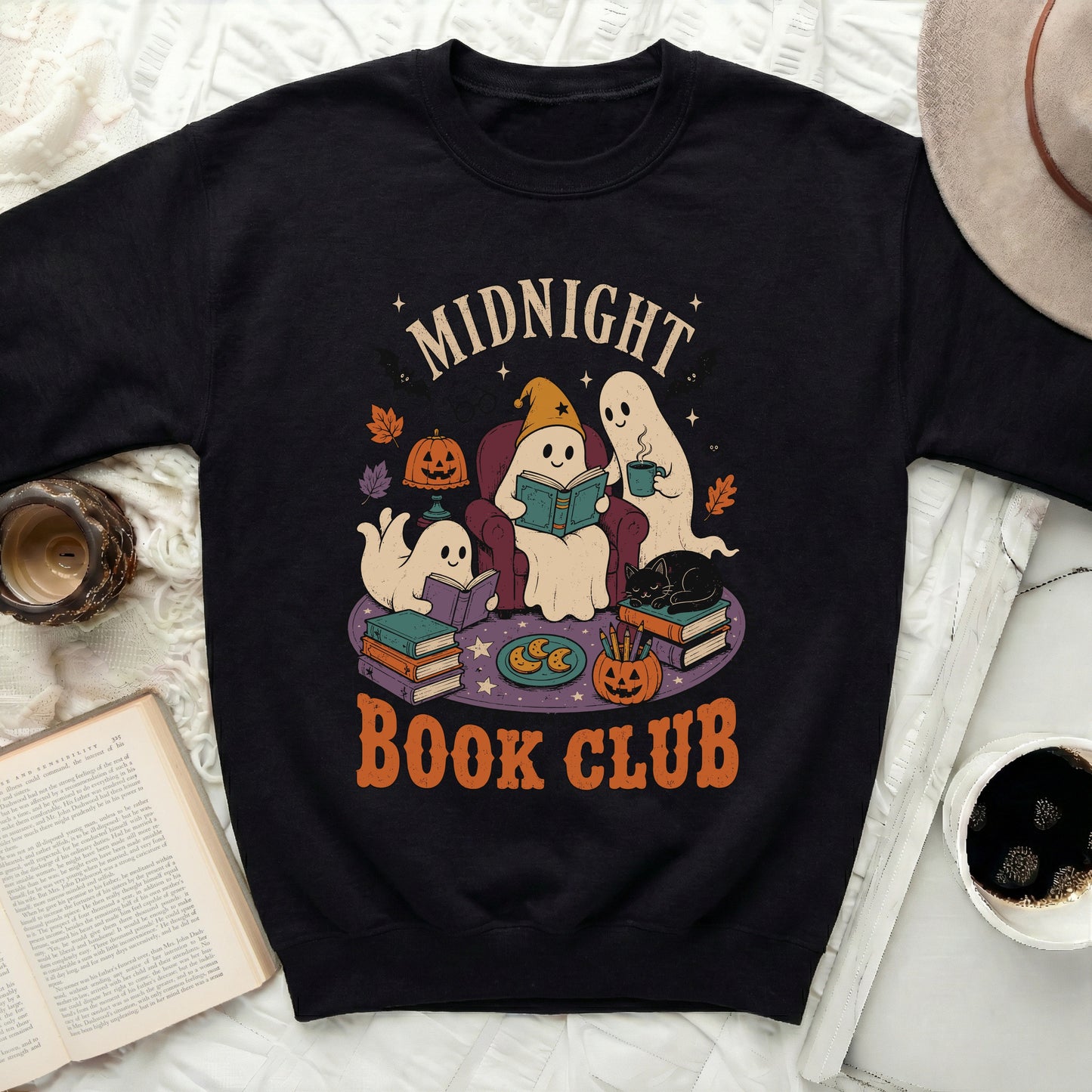 Black sweatshirt with "MIDNIGHT BOOK CLUB" and ghosts reading.