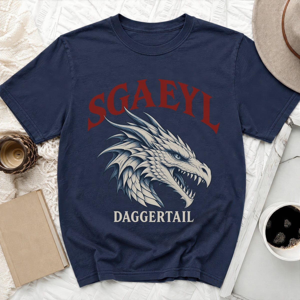 Navy t-shirt with dragon head graphic and "SGAEYL DAGGERTAIL" text.