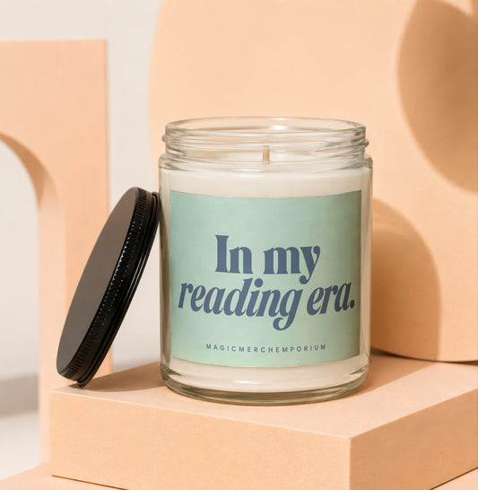 Candle with "In my reading era." and "MAGICMERCH}(EMPORIUM)" text.
