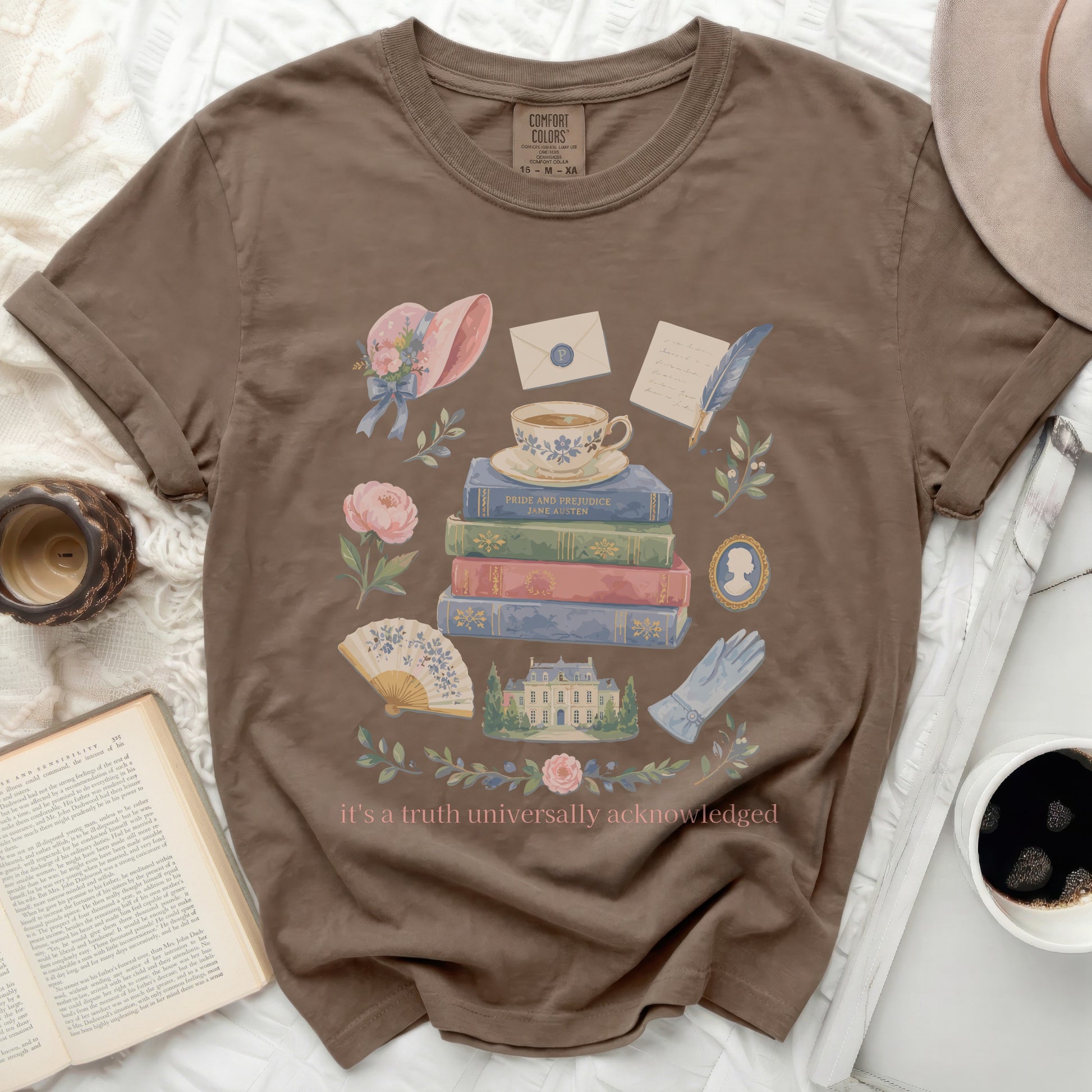 Brown t-shirt with literary and vintage illustrations and text.