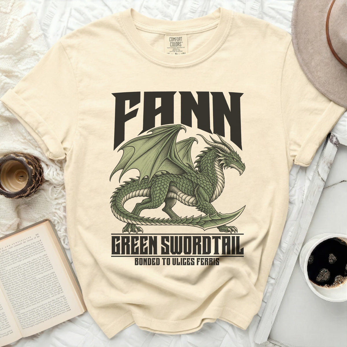 Light yellow t-shirt with green dragon graphic and text: "FANN GREEN SWORDTAIL BONDED TO ULICES FERRIS".
