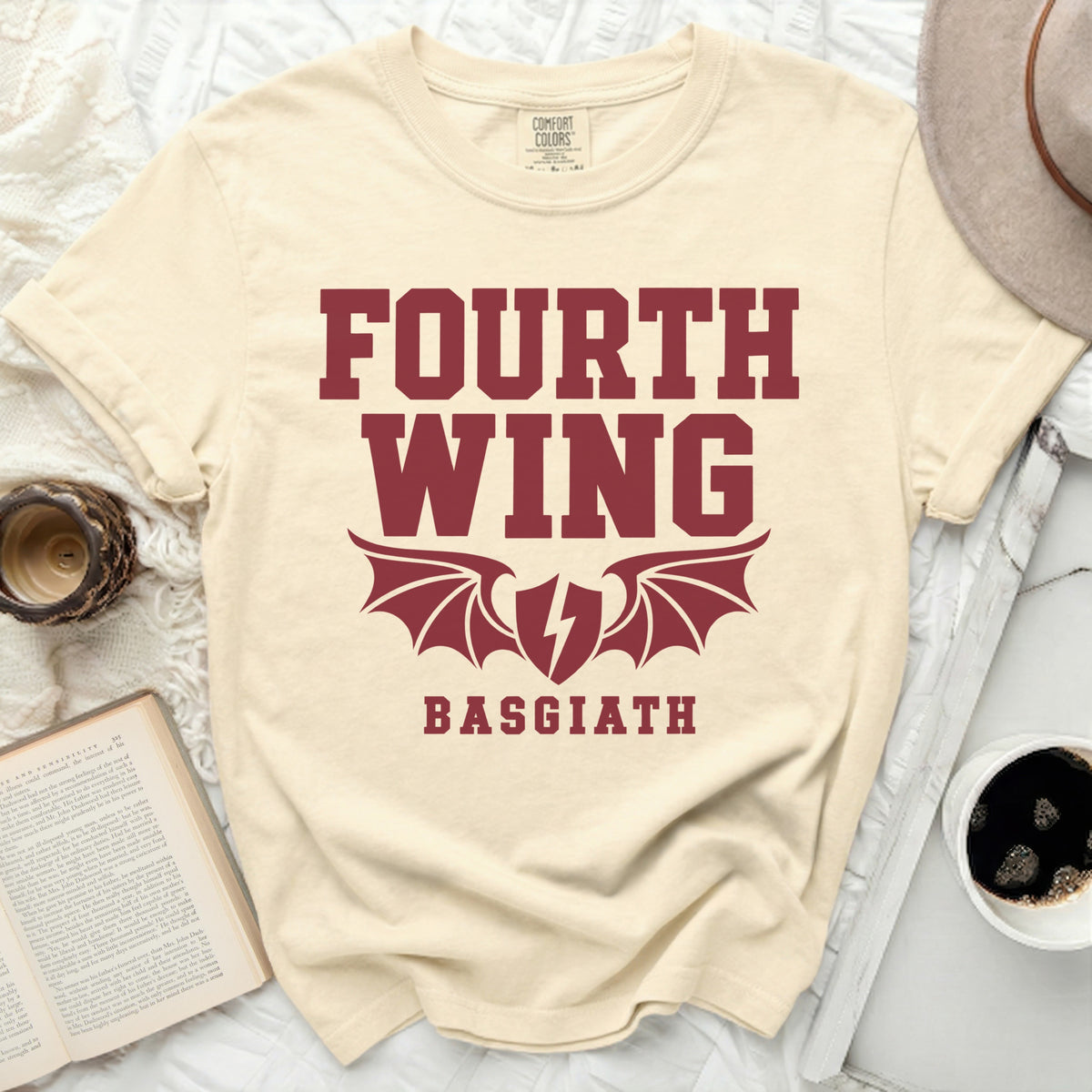 Cream t-shirt with "FOURTH WING BASGIATH" and winged shield graphic.