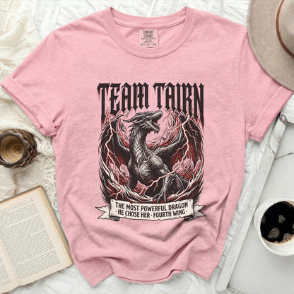 Pink t-shirt with a distressed dragon graphic and text.