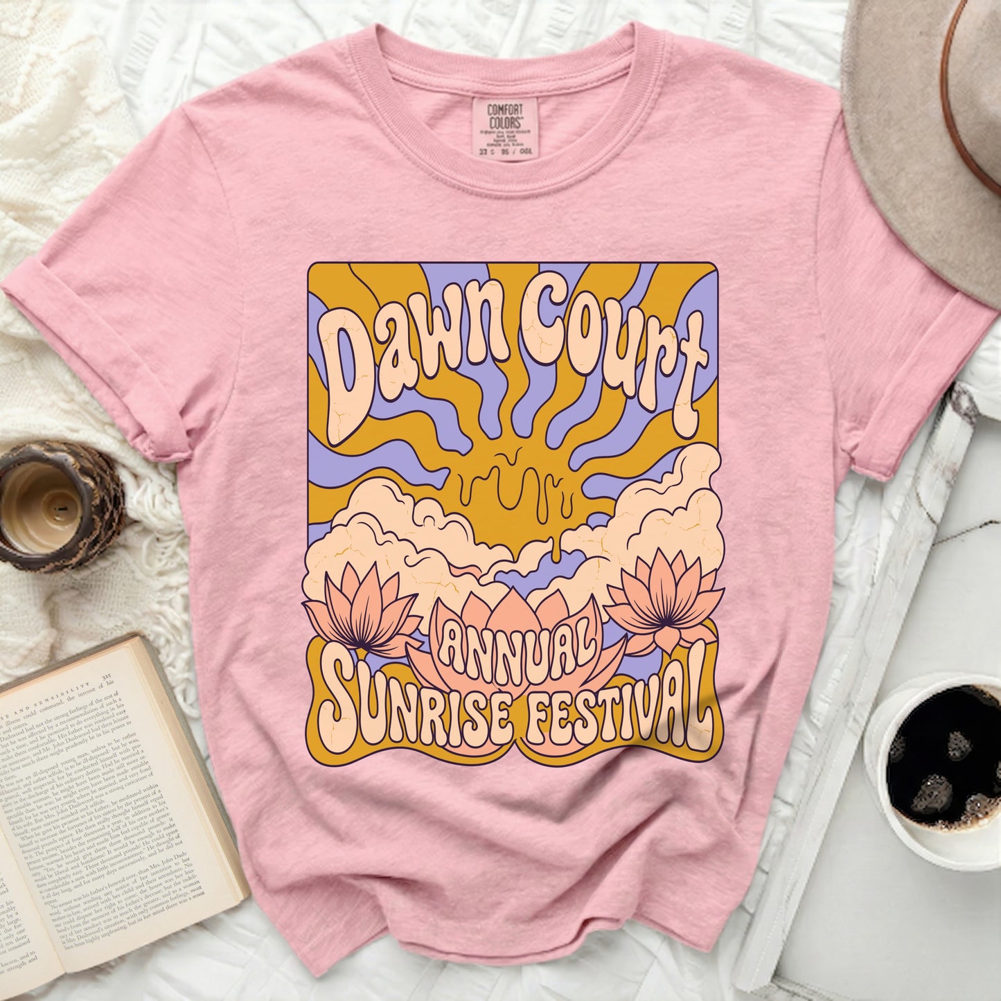 Pink t-shirt with "Dawn Court Annual Sunrise Festival" graphic.