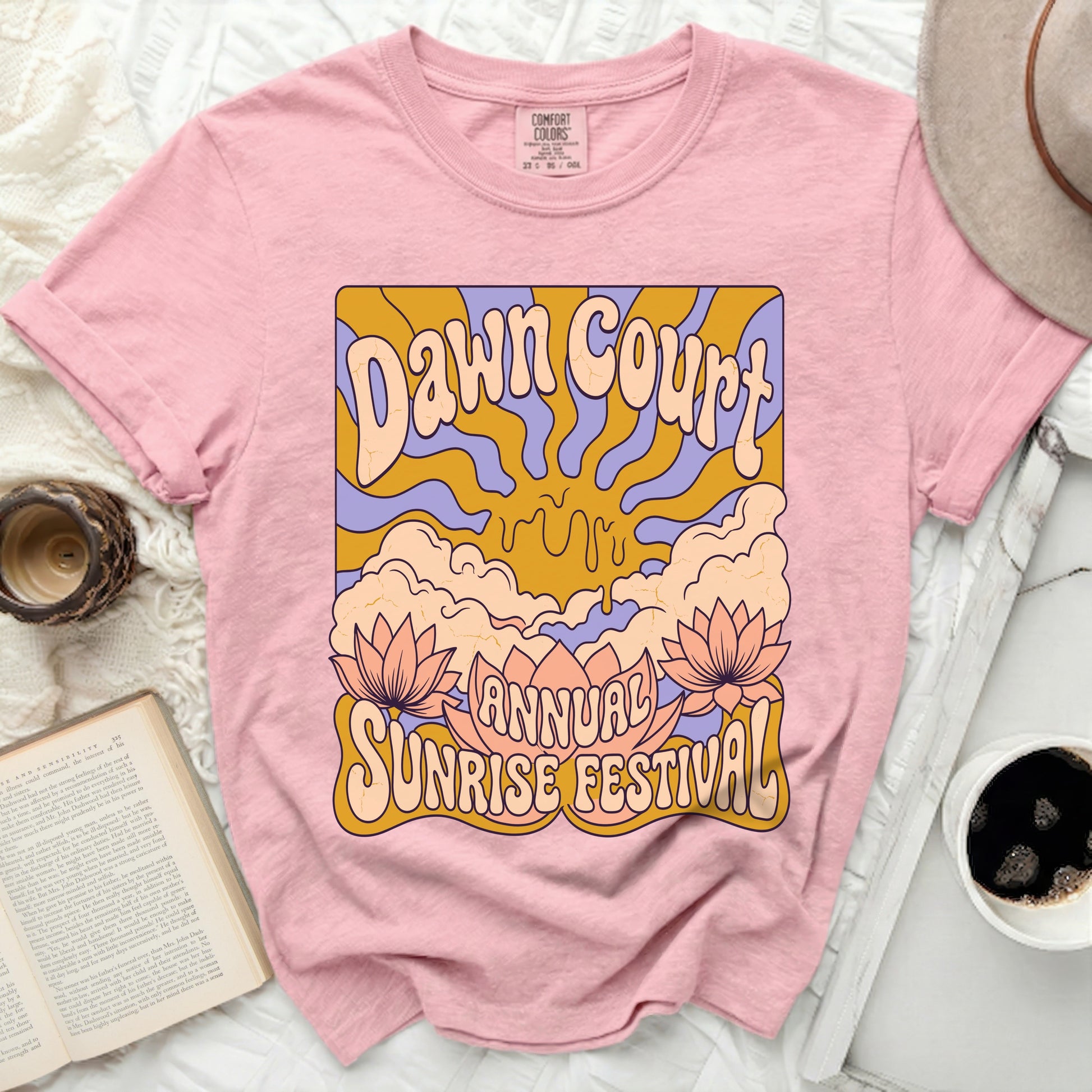 Pink t-shirt with "Dawn Court Annual Sunrise Festival" graphic.