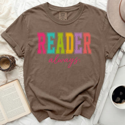 Brown t-shirt with "READER always" in colorful block letters.