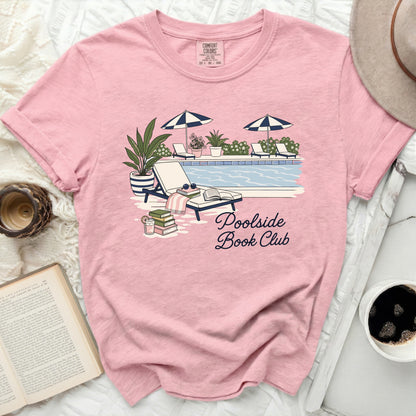 Pink t-shirt with "Poolside Book Club" text and poolside illustration.