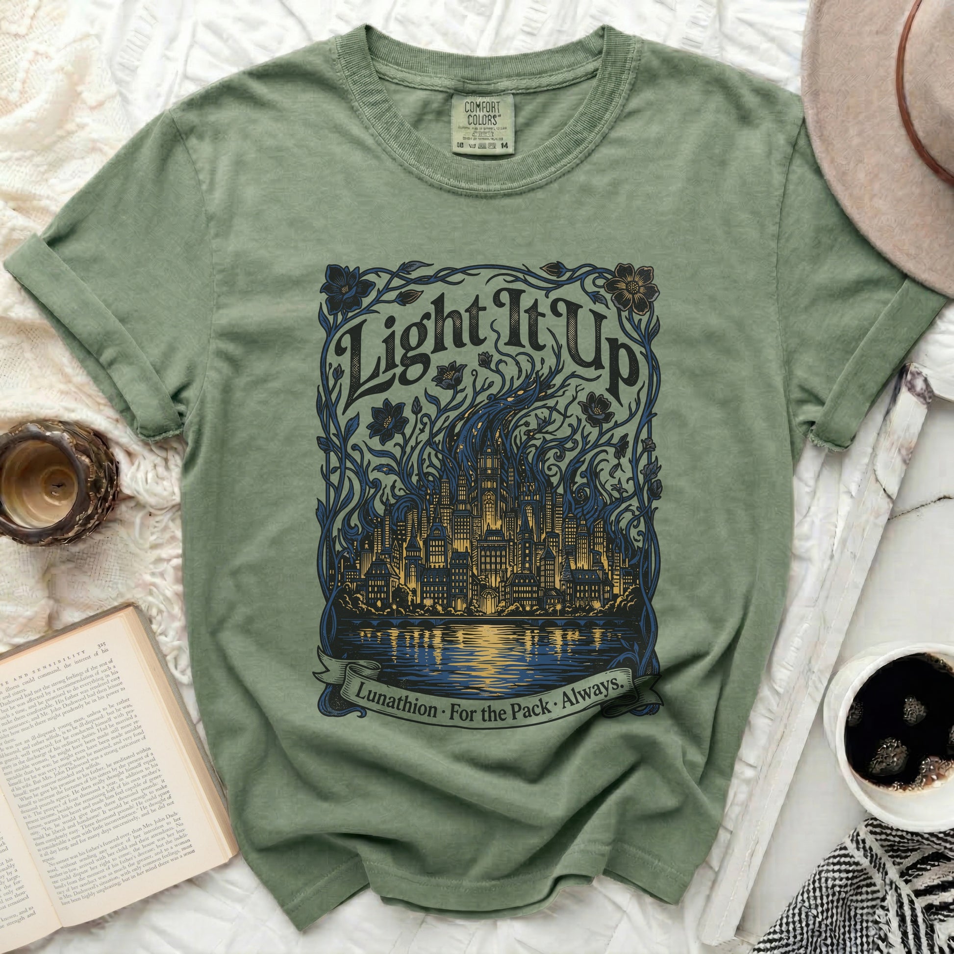 Green t-shirt with "Light It Up" city graphic and "Lunathion. For The Pack. Always."