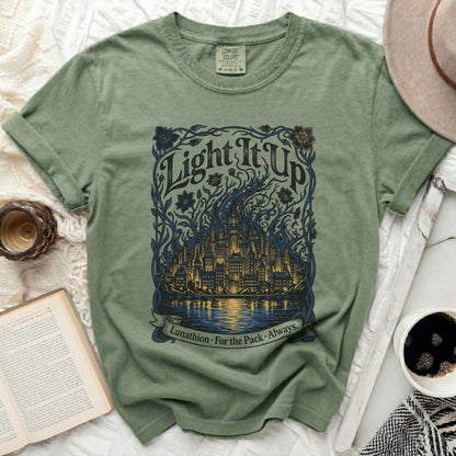 Green t-shirt with "Light It Up" city graphic and "Lunathion. For The Pack. Always."