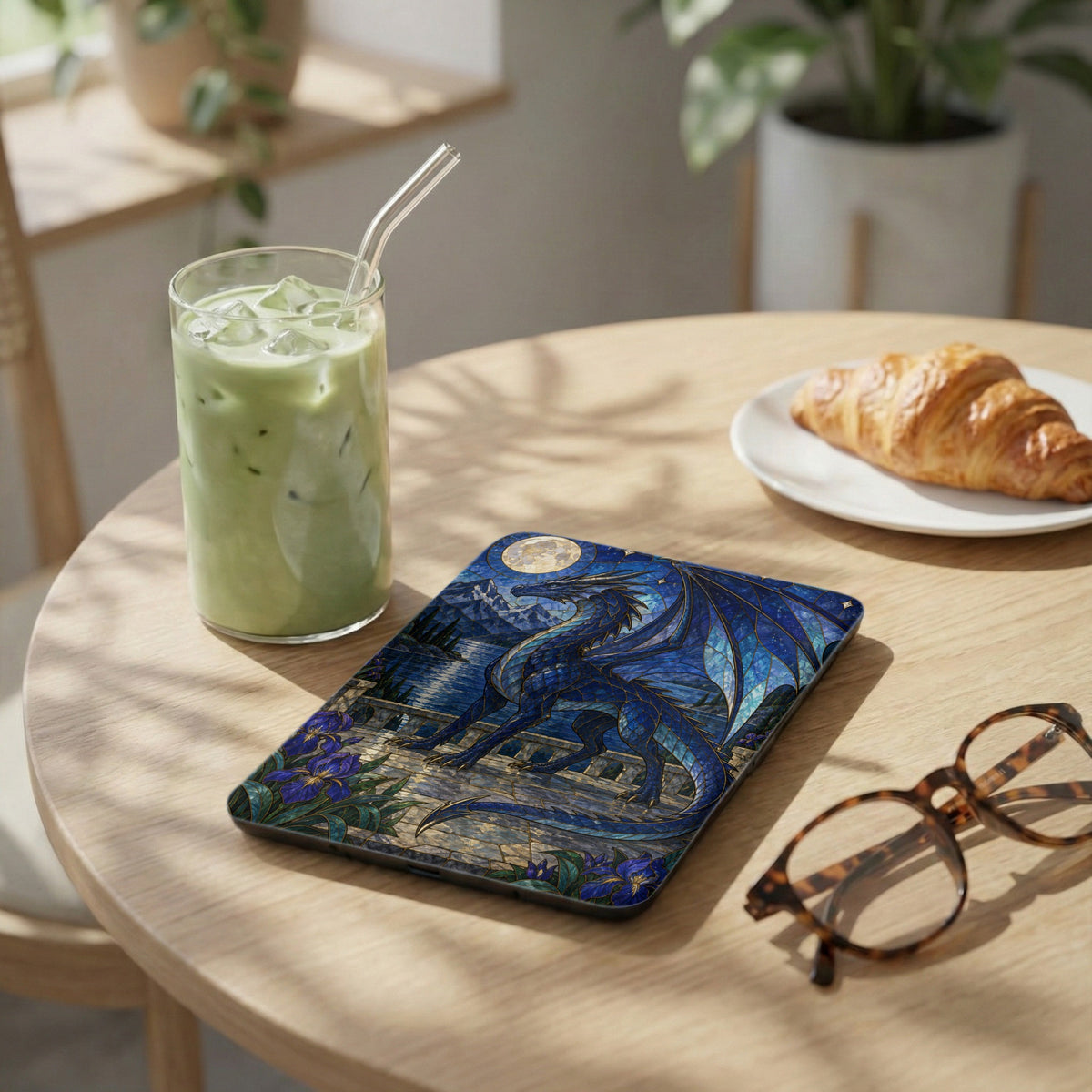 Blue dragon stained glass tablet case with irises and moon scene.