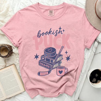 Pink t-shirt with "bookish + PUCK" and hockey illustration.