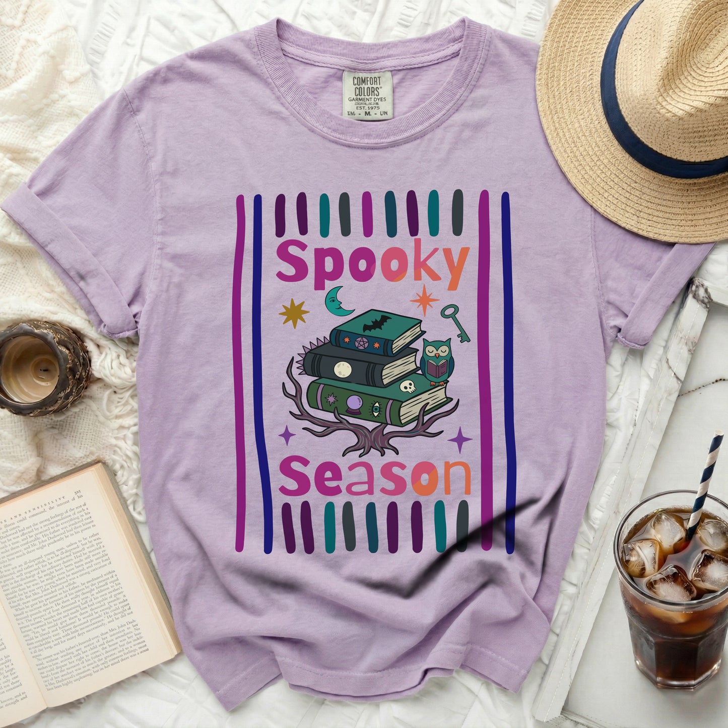 Purple shirt with "Spooky Season" graphic and Halloween icons.