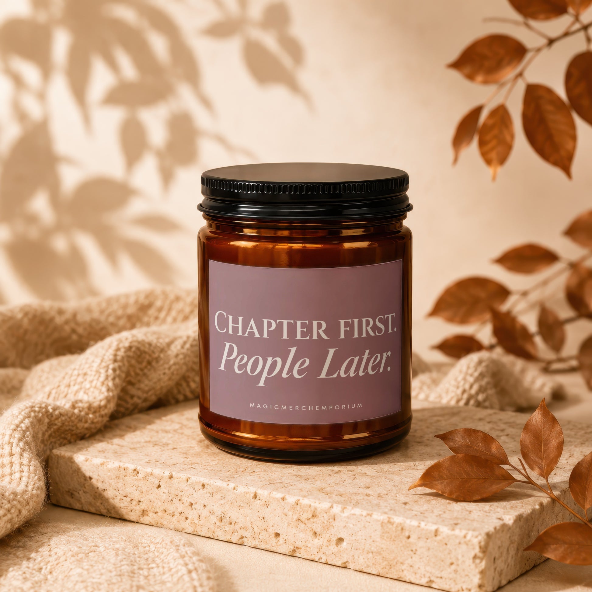 Amber candle with black lid, lit with text "Chapter First. People Later."