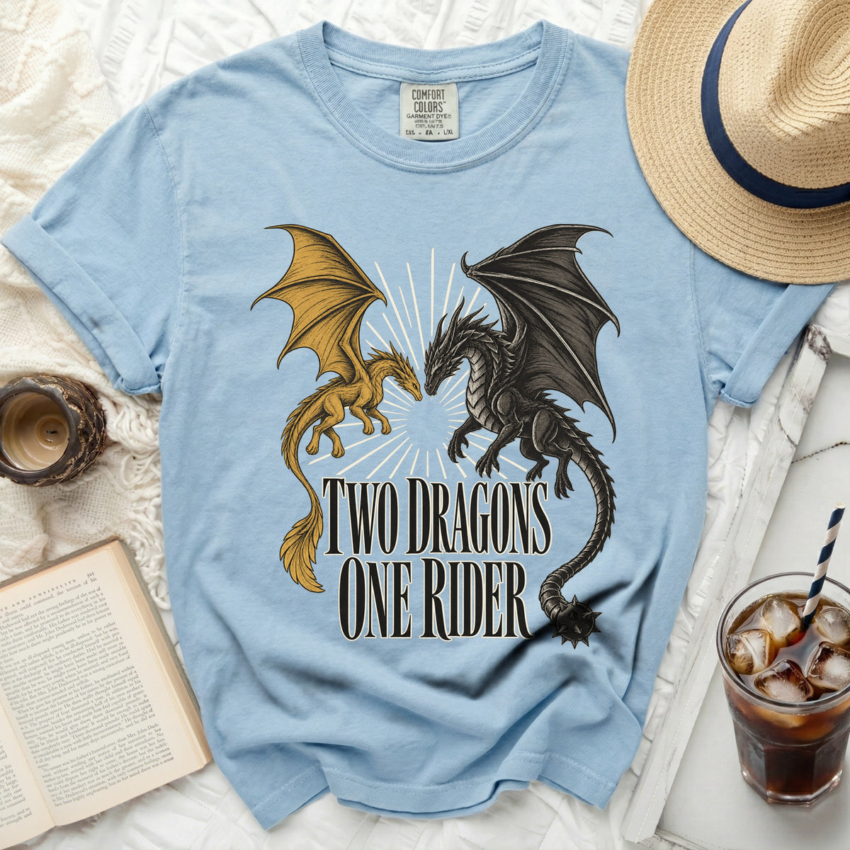 Light blue t-shirt with a black and gold dragon graphic and "TWO DRAGONS ONE RIDER" text.