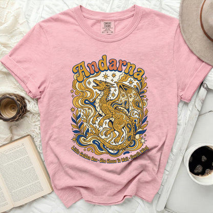 Pink t-shirt with gold dragon and "Andarna" text.