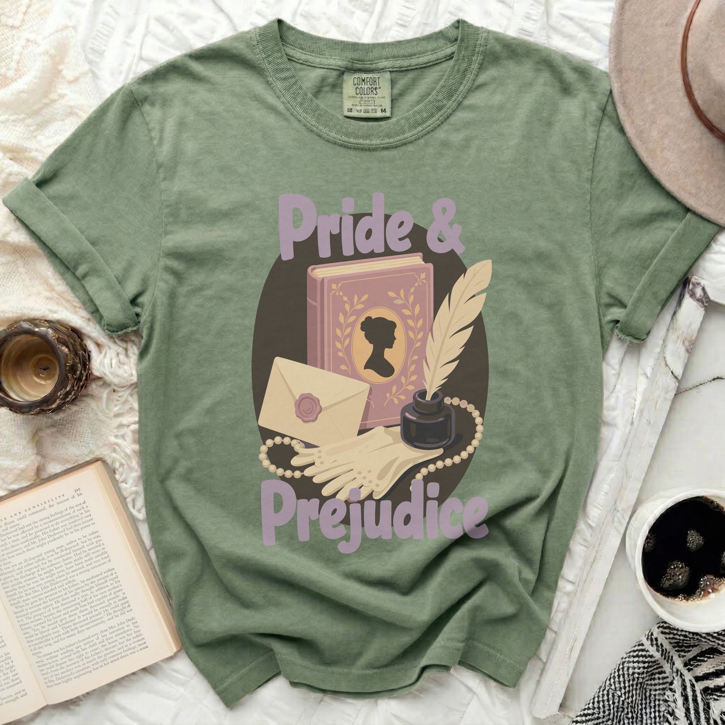 Green t-shirt with "Pride & Prejudice" text and literary motifs.