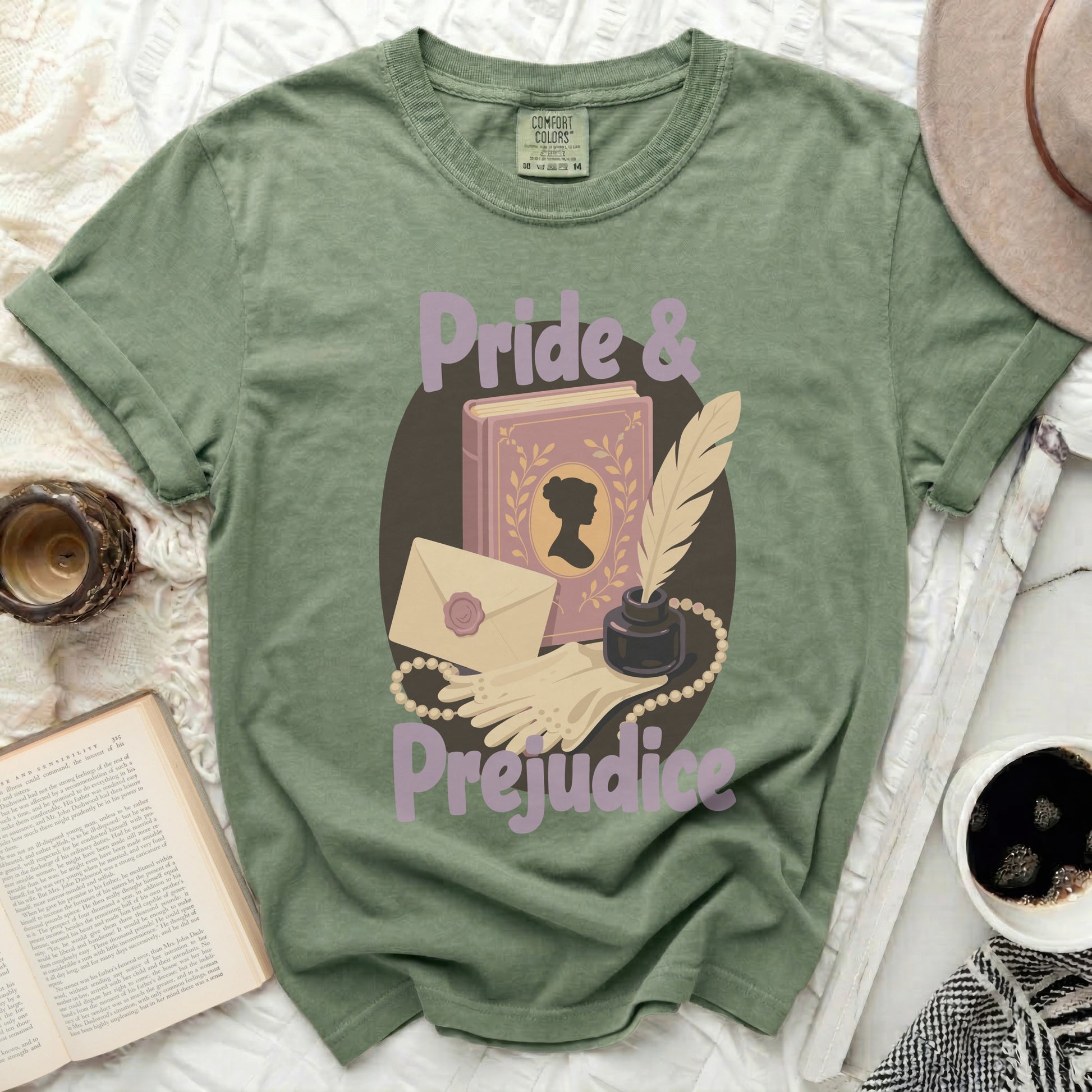 Green t-shirt with "Pride & Prejudice" text and literary motifs.