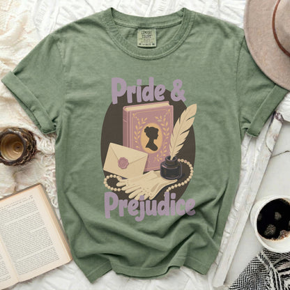 Green t-shirt with "Pride & Prejudice" text and literary motifs.