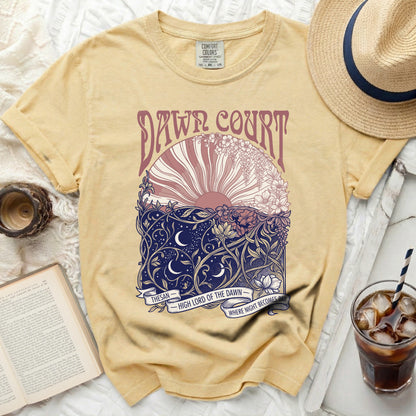 Yellow Comfort Colors t-shirt with "Dawn Court" and sun/moon floral design.