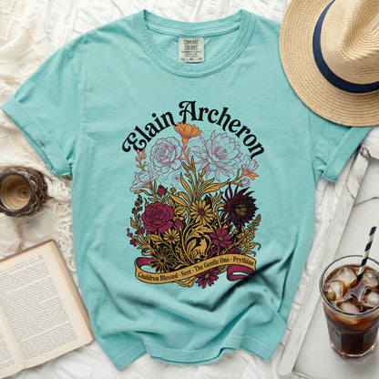 Teal t-shirt with "Elain Archeron" and floral design.