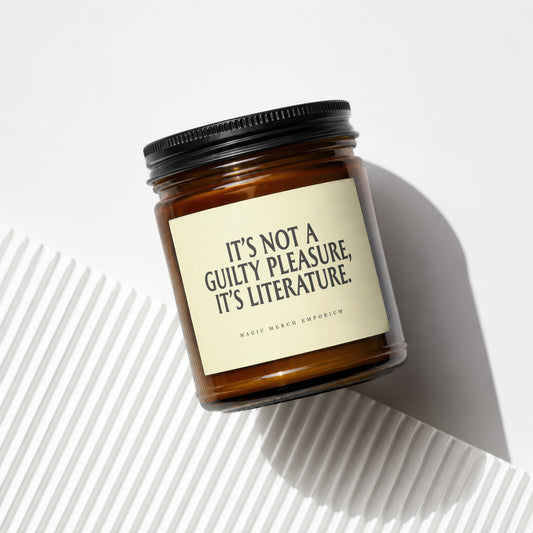Amber glass candle with cream label reading "It's Not a Guilty Pleasure, It's Literature."