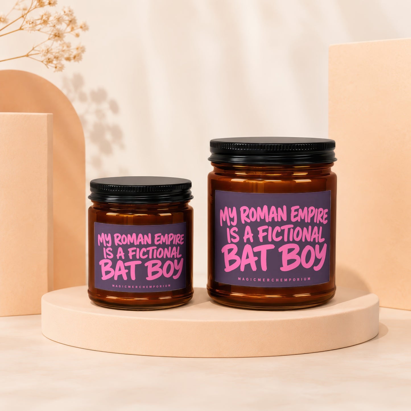 Two candles with "My Roman Empire is a Fictional Bat Boy" text on labels.