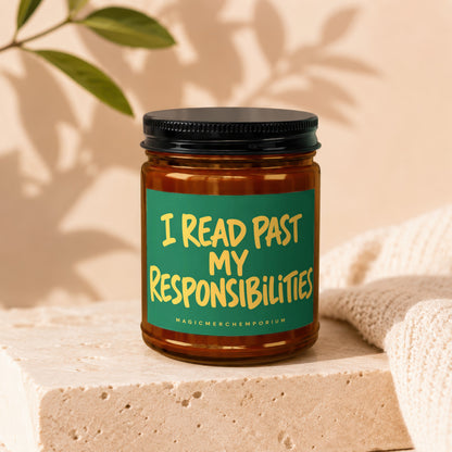 Candle with green label reading "I READ PAST MY RESPONSIBILITIES" with 'MAGICMERCHEMPORIUM' below.