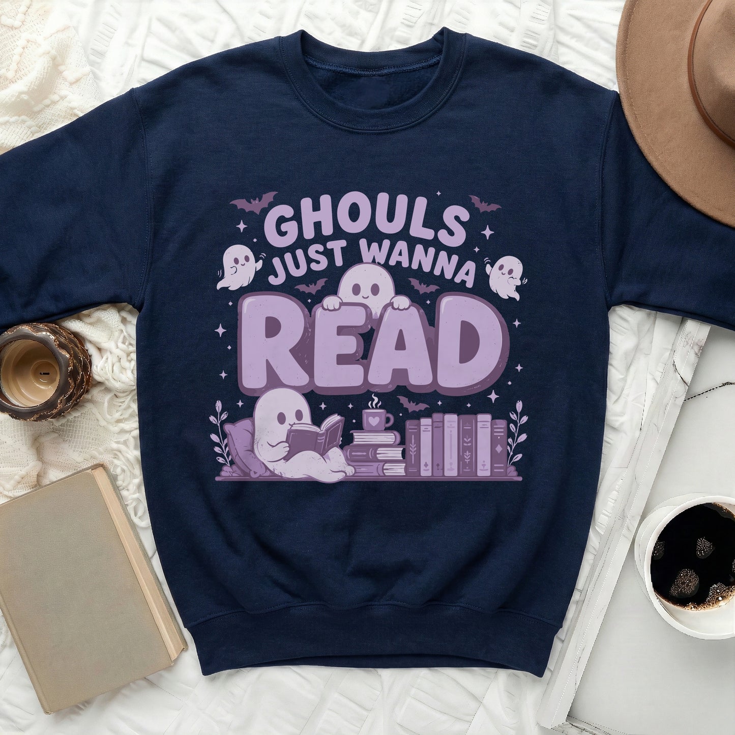 Navy sweatshirt with "Ghouls Just Wanna Read" graphic featuring ghosts and books.