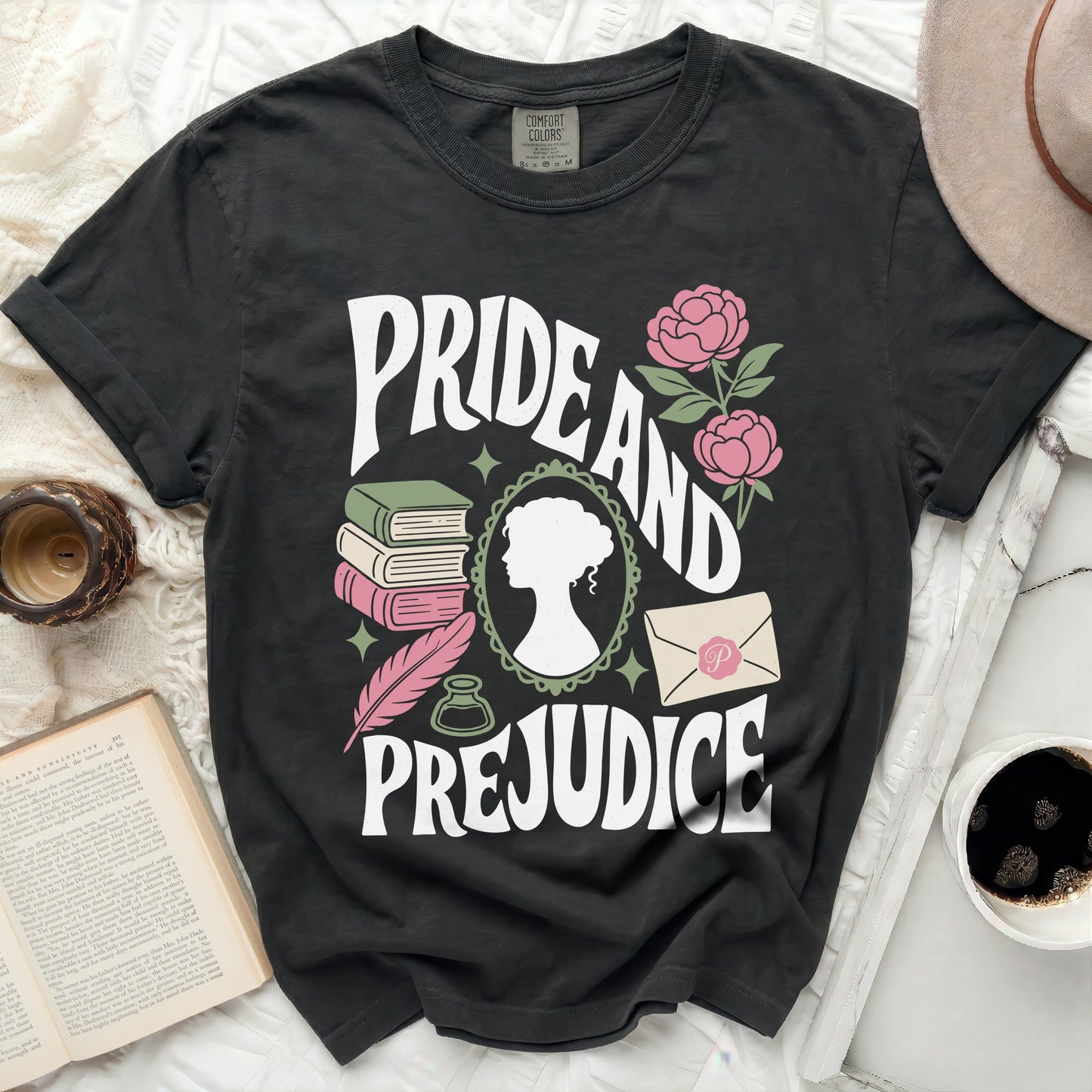 Pride and Prejudice graphic tee with books, quill, and silhouette.