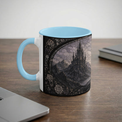 Mug with light blue handle featuring a gothic castle and roses design.