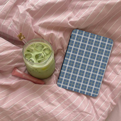 Blue Plaid Tablet Cover on Pink Striped Bedsheet
