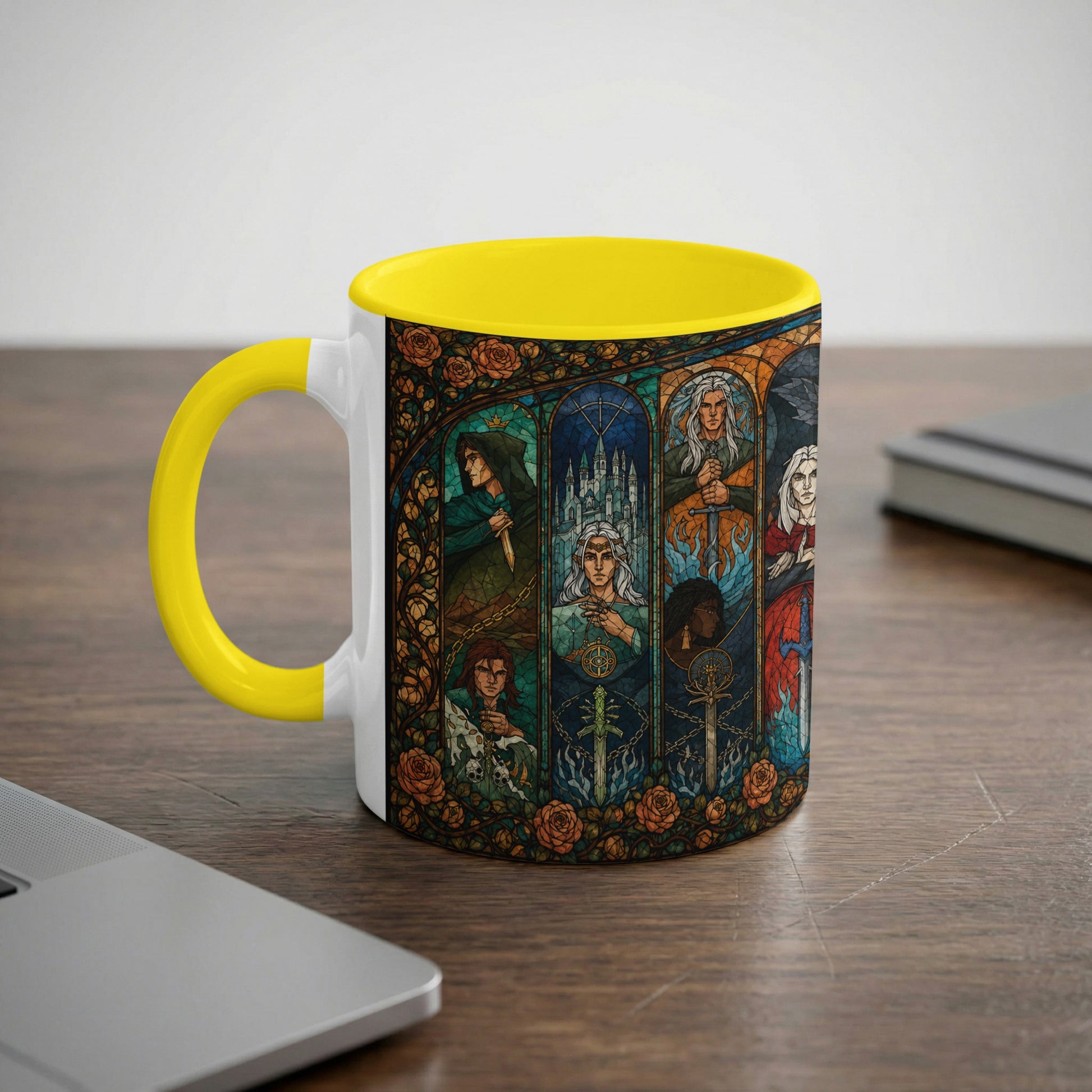 White mug with yellow handle featuring stained glass art of fantasy characters and swords.