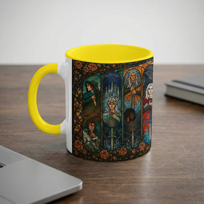 White mug with yellow handle featuring stained glass art of fantasy characters and swords.