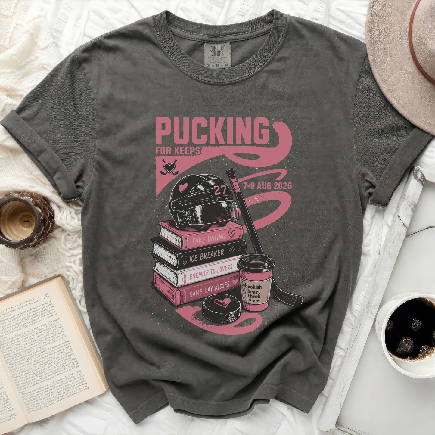 Grey t-shirt with "Pucking for Keeps" and book titles.
