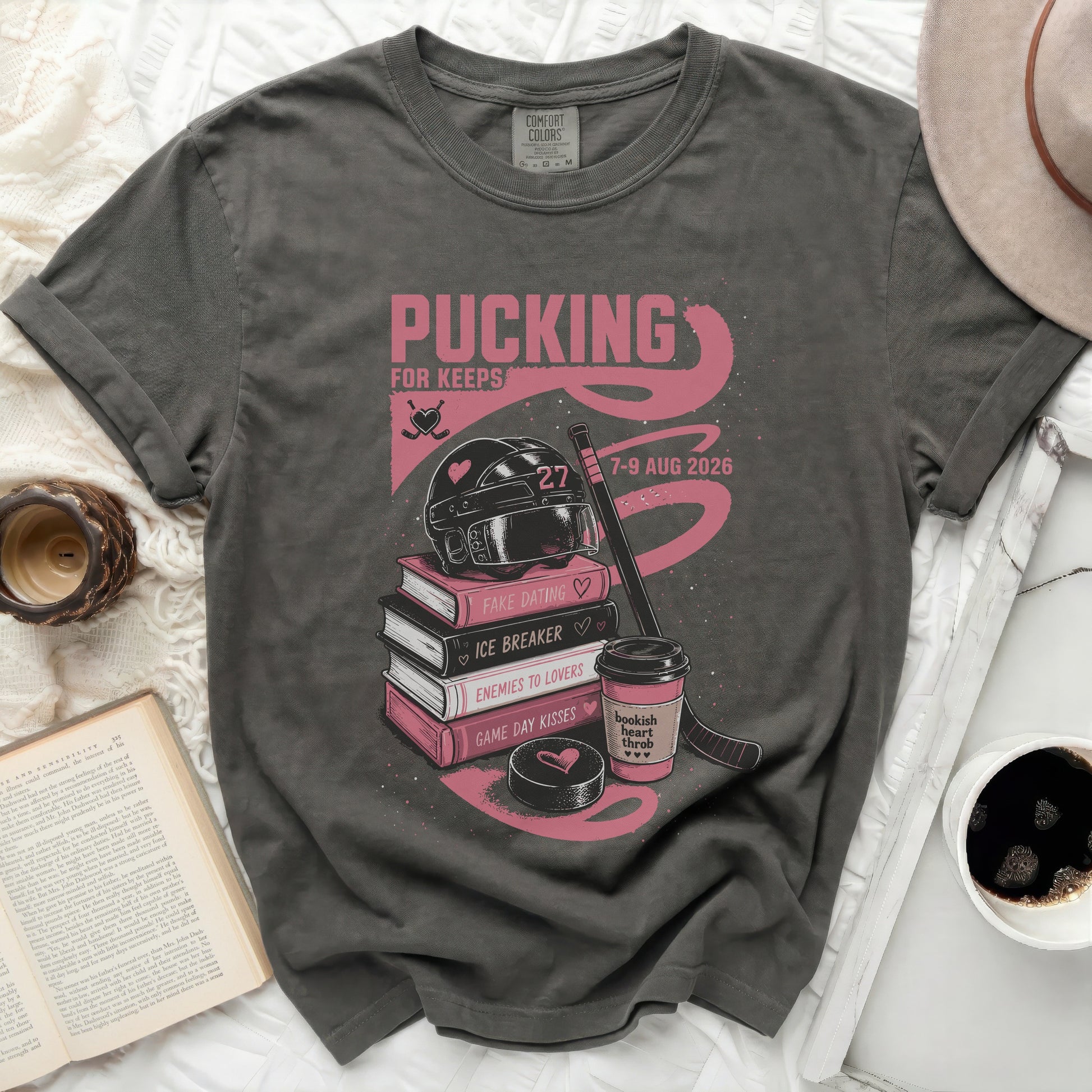 Grey t-shirt with "Pucking for Keeps" and book titles.