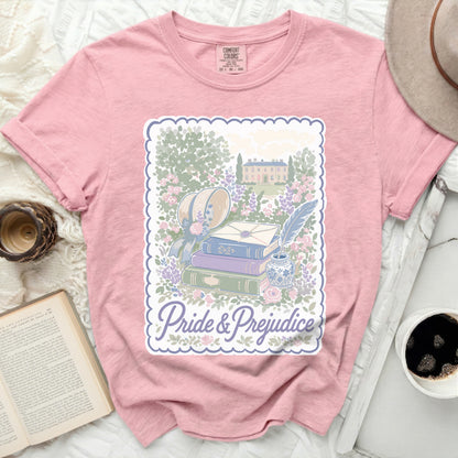 Pink Comfort Colors t-shirt with "Pride & Prejudice" and garden illustration.
