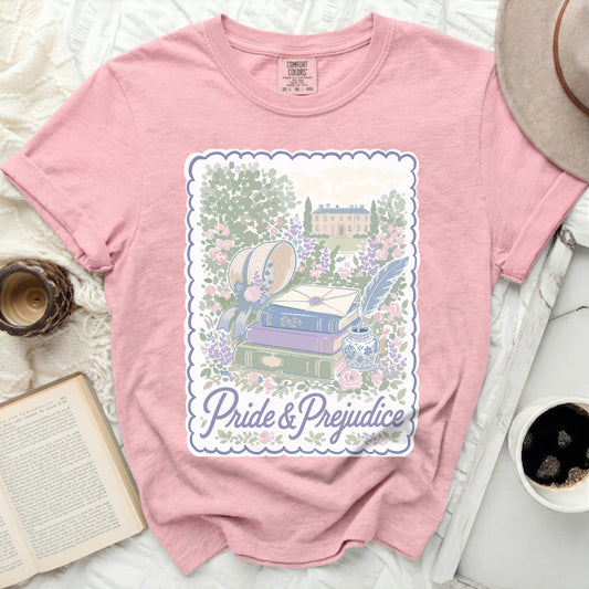 Pink Comfort Colors t-shirt with "Pride & Prejudice" and garden illustration.