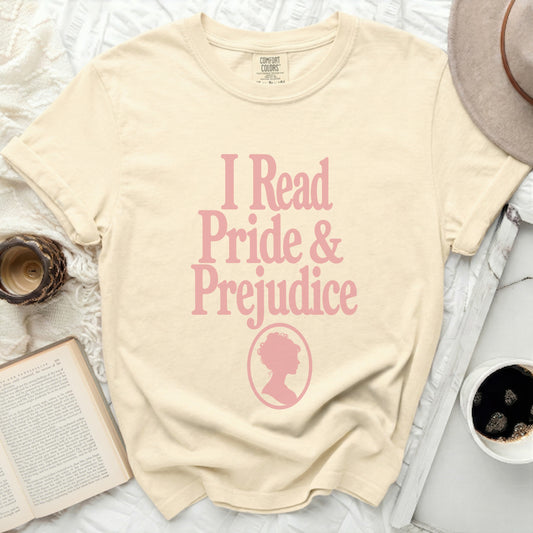 Cream t-shirt with pink "I Read Pride & Prejudice" text.
