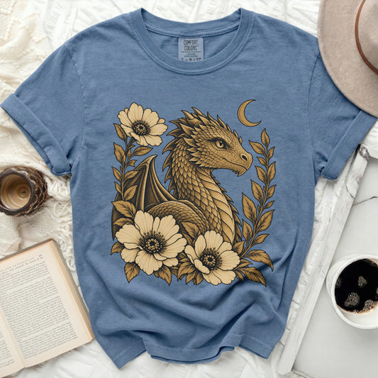 Blue t-shirt with a golden dragon, flowers, and crescent moon graphic.