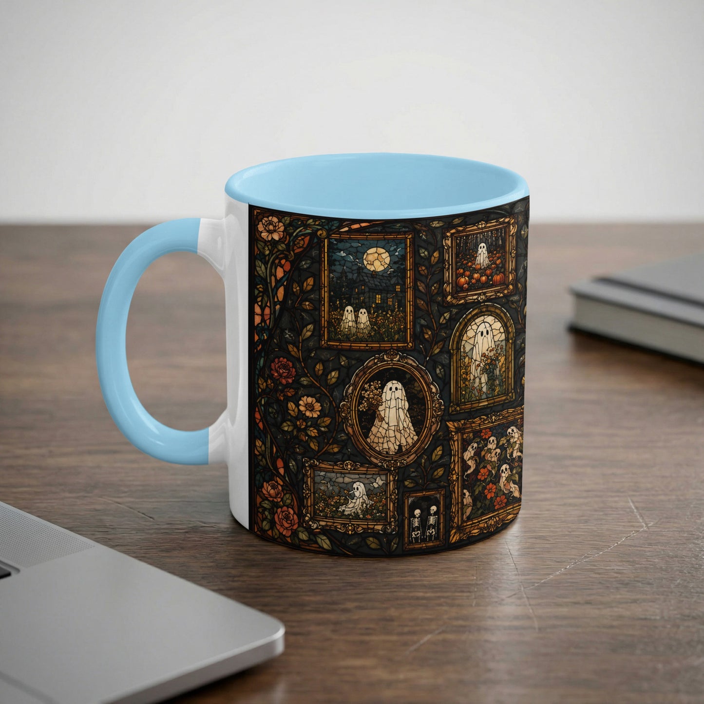 White mug with blue handle features stained glass ghost and pumpkin art.
