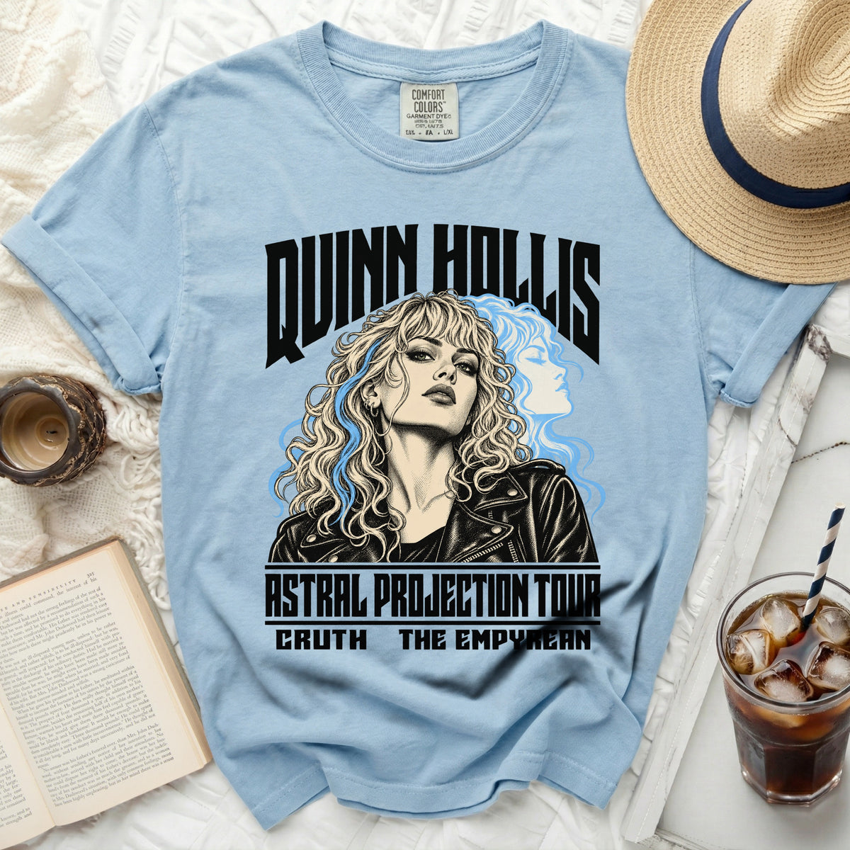 Light blue t-shirt with "QUINN HOLLIS ASTRAL PROJECTION TOUR" text and illustration.