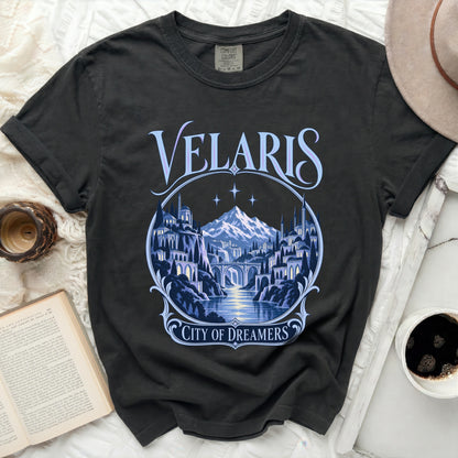 Dark t-shirt with "VELARIS CITY OF DREAMERS" graphic.
