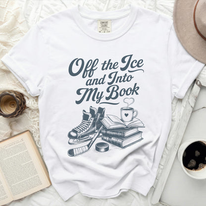 White t-shirt with "Off the Ice and Into My Book" text and graphics.